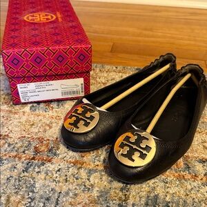 Tory Burch Black Ballet Flats with Gold Emblem